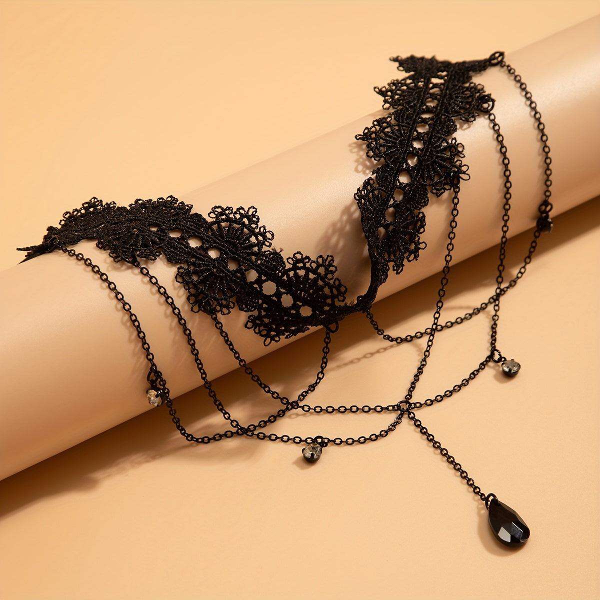 cascading black lace gemmed leg adornment
