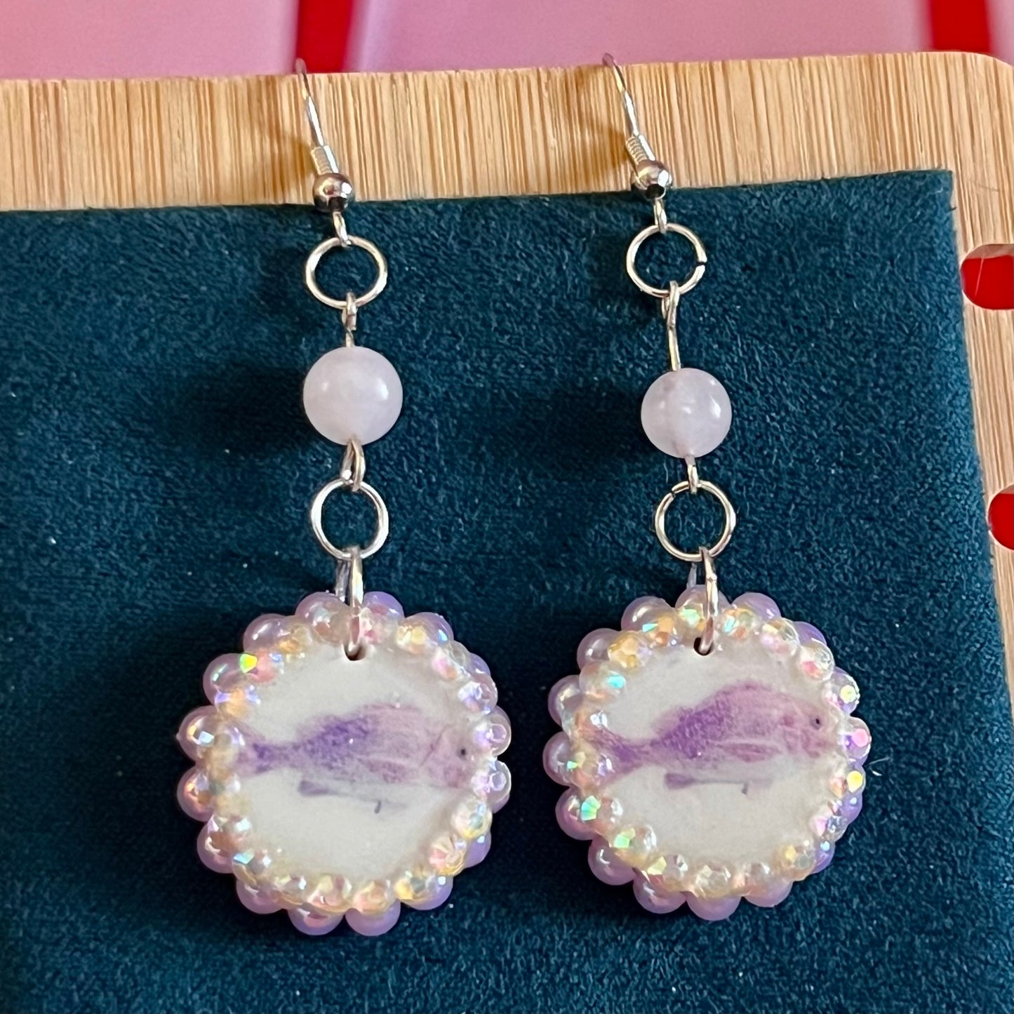 rose quartz earrings, pastel fish earrings, pink fish charm earrings, mermaidcore earrings, fairycore jewelry, coquette earrings, y2k earrings, pastel charm earrings, polymer clay earrings, rhinestone earrings, pearl earrings, iridescent pearl earrings, ocean themed earrings, handmade earrings, hypoallergenic earrings, cute pastel jewelry, rose quartz bead earrings, girly earrings, whimsical earrings, gift for her