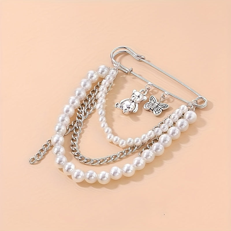 'pretty pearled teddy' safety-pin adornment