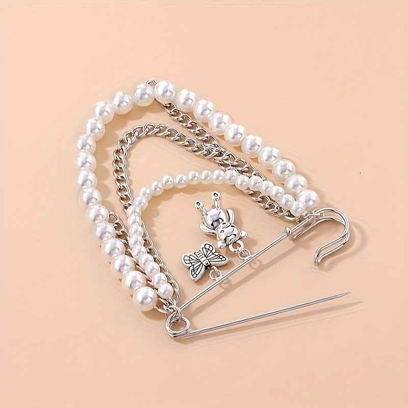 'pretty pearled teddy' safety-pin adornment