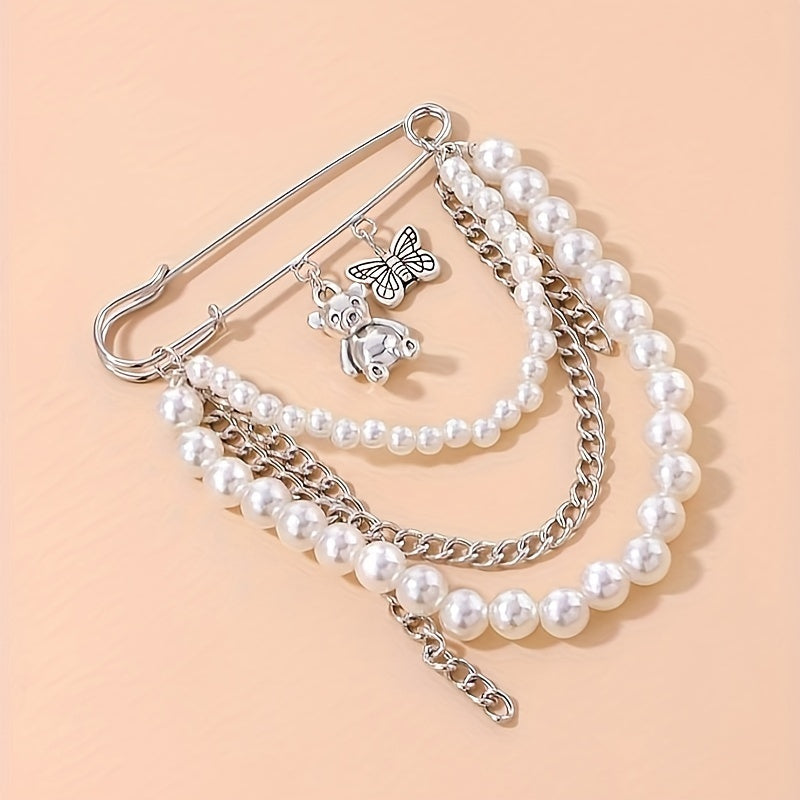 'pretty pearled teddy' safety-pin adornment