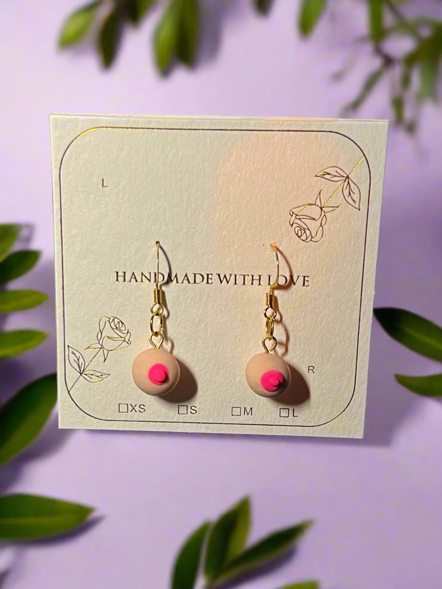 Earrings with pink beads on a 'Handmade with Love' card