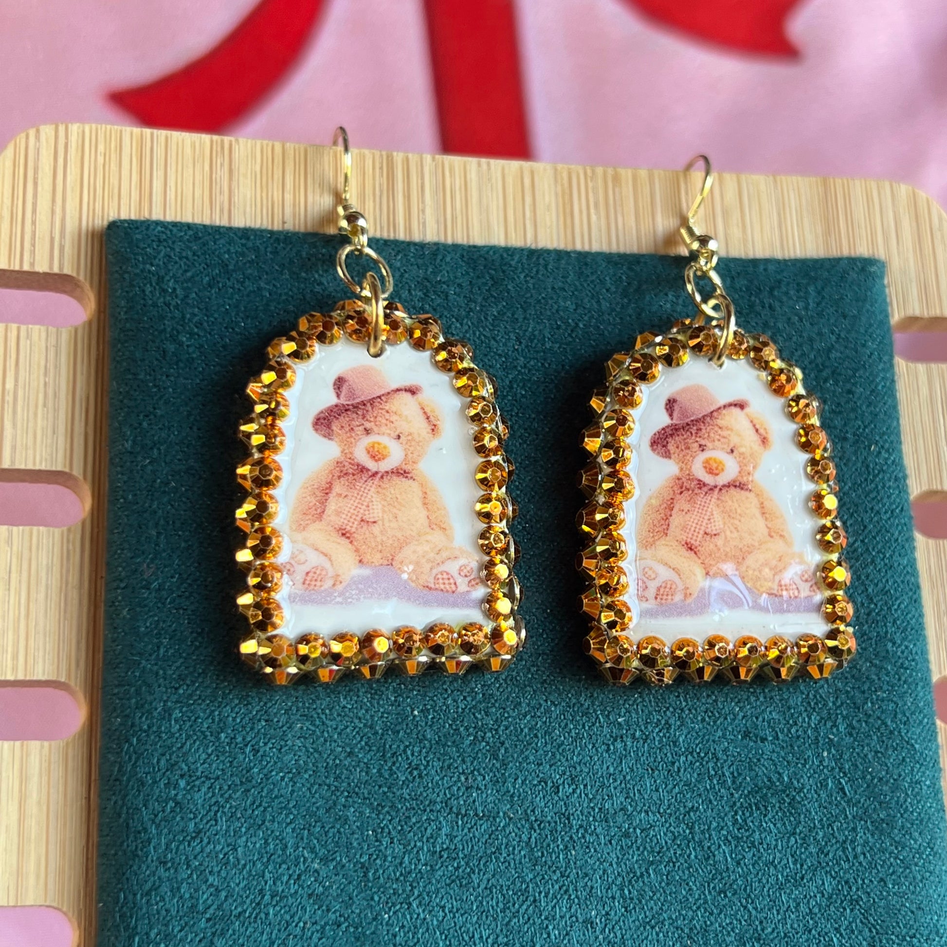 teddy bear earrings, bear earrings, teddy in hat earrings, kawaii earrings, kidcore earrings, indie earrings, party earrings, plushie earrings, polymer clay earrings, handmade earrings, clay statement earrings, orange rhinestone earrings, 14k gold plated earrings, cute animal earrings, novelty earrings, maximalist earrings, Olive Made jewelry, wearable art earrings, handmade bear jewelry, kawaii jewelry, kidcore jewelry, ready to ship earrings