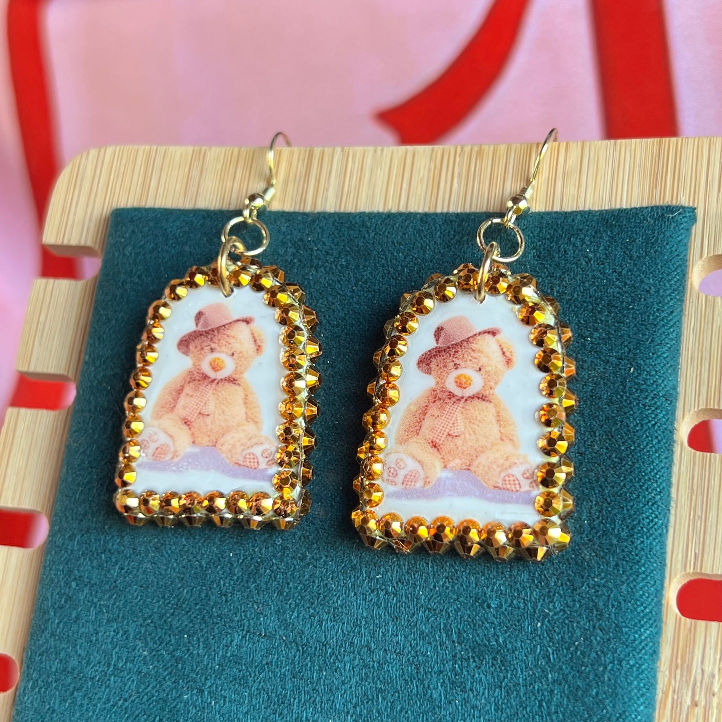 teddy bear earrings, bear earrings, teddy in hat earrings, kawaii earrings, kidcore earrings, indie earrings, party earrings, plushie earrings, polymer clay earrings, handmade earrings, clay statement earrings, orange rhinestone earrings, 14k gold plated earrings, cute animal earrings, novelty earrings, maximalist earrings, Olive Made jewelry, wearable art earrings, handmade bear jewelry, kawaii jewelry, kidcore jewelry, ready to ship earrings