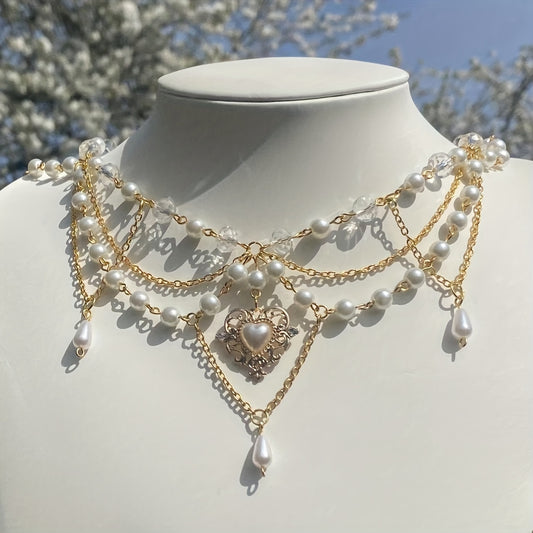 rose white cascading neck adornment