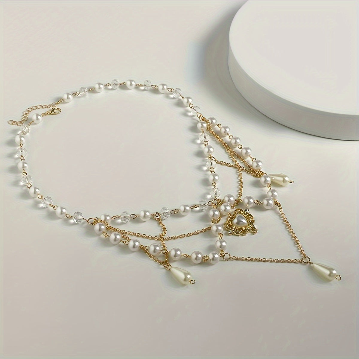 rose white cascading neck adornment