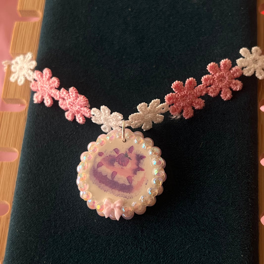 Handcrafted polymer‑clay strawberry cake flower choker in pink lace, featuring iridescent pearls, rhinestones, and a cute coquette kawaii design—perfect sweet‑lolita, pastel, y2k aesthetic jewelry.