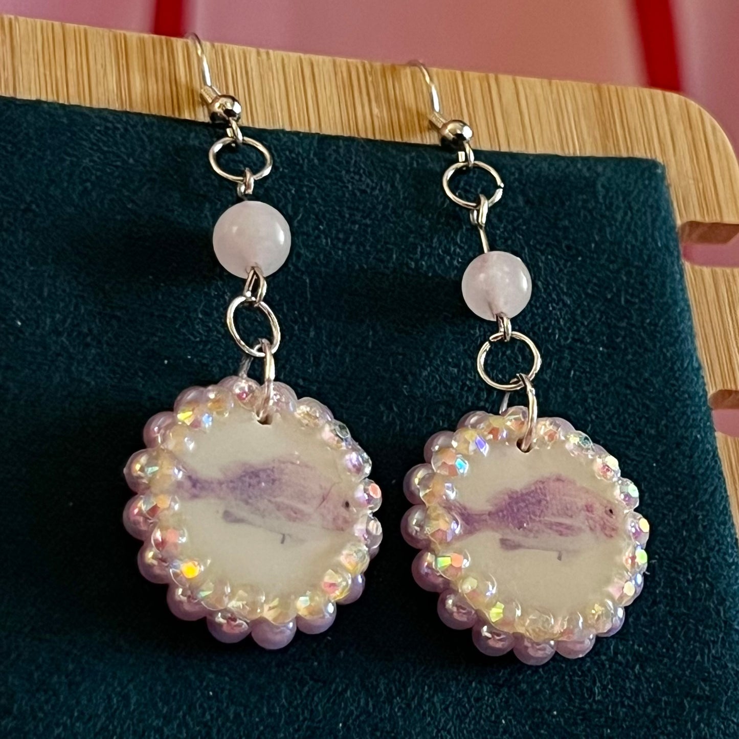 rose quartz earrings, pastel fish earrings, pink fish charm earrings, mermaidcore earrings, fairycore jewelry, coquette earrings, y2k earrings, pastel charm earrings, polymer clay earrings, rhinestone earrings, pearl earrings, iridescent pearl earrings, ocean themed earrings, handmade earrings, hypoallergenic earrings, cute pastel jewelry, rose quartz bead earrings, girly earrings, whimsical earrings, gift for her