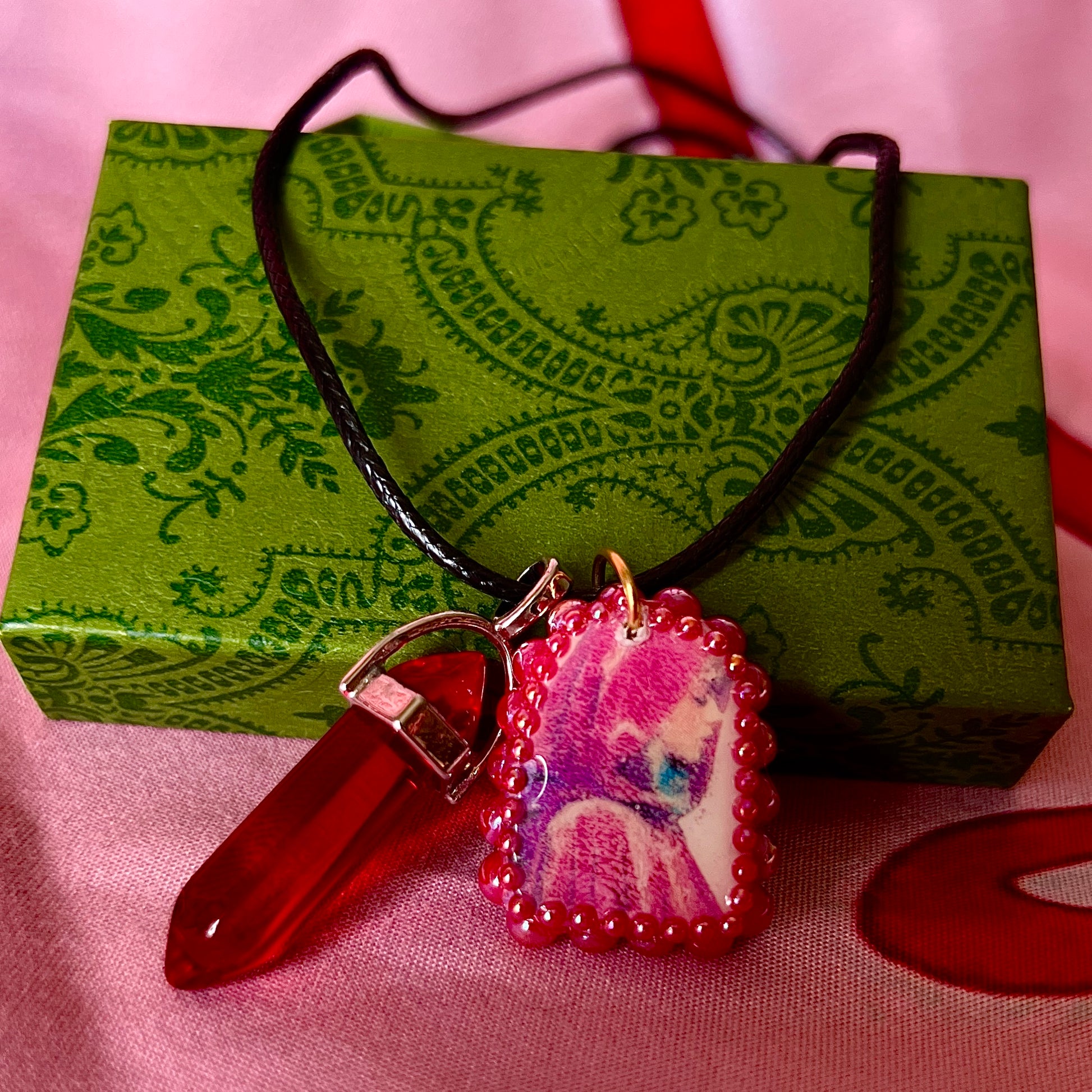 Red Riding Hood charm necklace — handmade polymer clay Red Riding Hood pendant hand-bedazzled with iridescent pearls + rhinestones, plus deep red crystal accent. Choose arch-shaped charm or square charm with burgundy + black gem drop. Gift-ready Victorian-patterned box. Fairycore goth Y2K dark fairytale jewelry; ready to ship in 1–3 days.