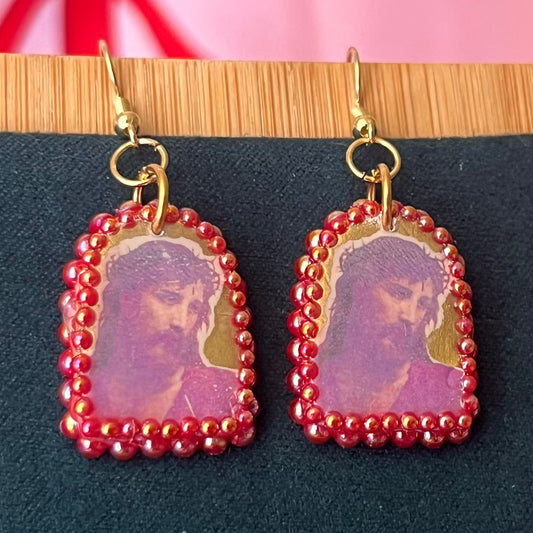 Handmade 1" polymer‑clay Yeshua (Jesus) earrings with gold aura background, iridescent pearl frame, and 18k gold‑plated findings – yeshua earrings, jesus earrings, religious art earrings, christian jewelry, sacred art jewelry, gold aura earrings, arch earrings, polymer clay earrings, image transfer earrings, pearl frame earrings, iridescent pearl earrings, 18k gold plated earrings, handmade earrings, wearable art earrings.
