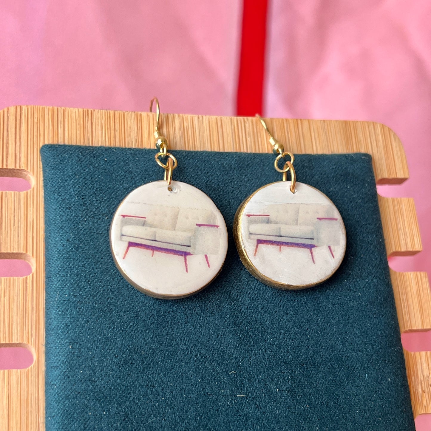 Handmade white couch earrings—polymer‑clay mini sofa charms painted with metallic gold, featuring gold‑plated hypoallergenic hooks; perfect retro Y2K dreamcore jewelry for quirky, miniature‑object lovers.