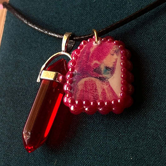 Red Riding Hood charm necklace — handmade polymer clay Red Riding Hood pendant hand-bedazzled with iridescent pearls + rhinestones, plus deep red crystal accent. Choose arch-shaped charm or square charm with burgundy + black gem drop. Gift-ready Victorian-patterned box. Fairycore goth Y2K dark fairytale jewelry; ready to ship in 1–3 days.
