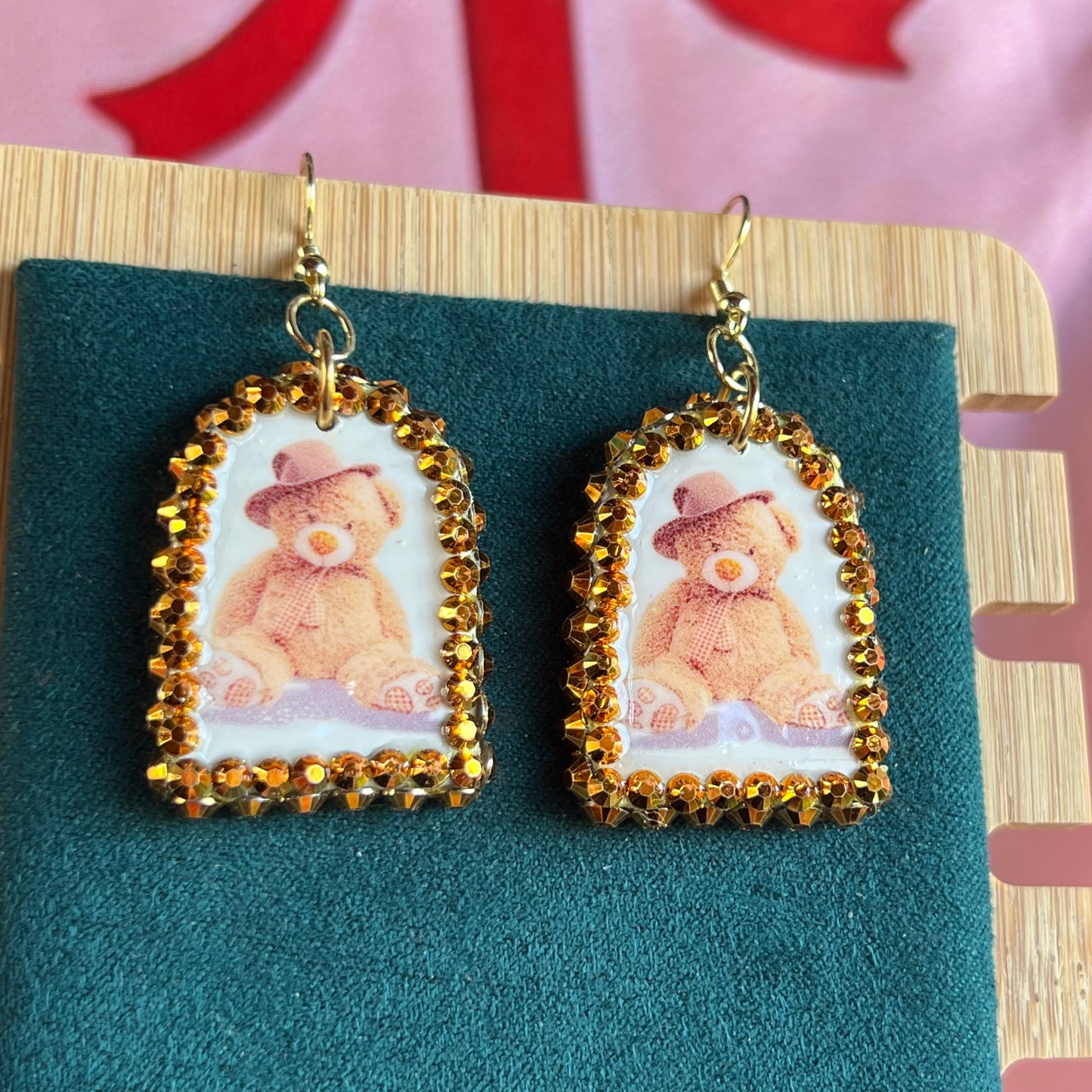 teddy bear earrings, bear earrings, teddy in hat earrings, kawaii earrings, kidcore earrings, indie earrings, party earrings, plushie earrings, polymer clay earrings, handmade earrings, clay statement earrings, orange rhinestone earrings, 14k gold plated earrings, cute animal earrings, novelty earrings, maximalist earrings, Olive Made jewelry, wearable art earrings, handmade bear jewelry, kawaii jewelry, kidcore jewelry, ready to ship earrings