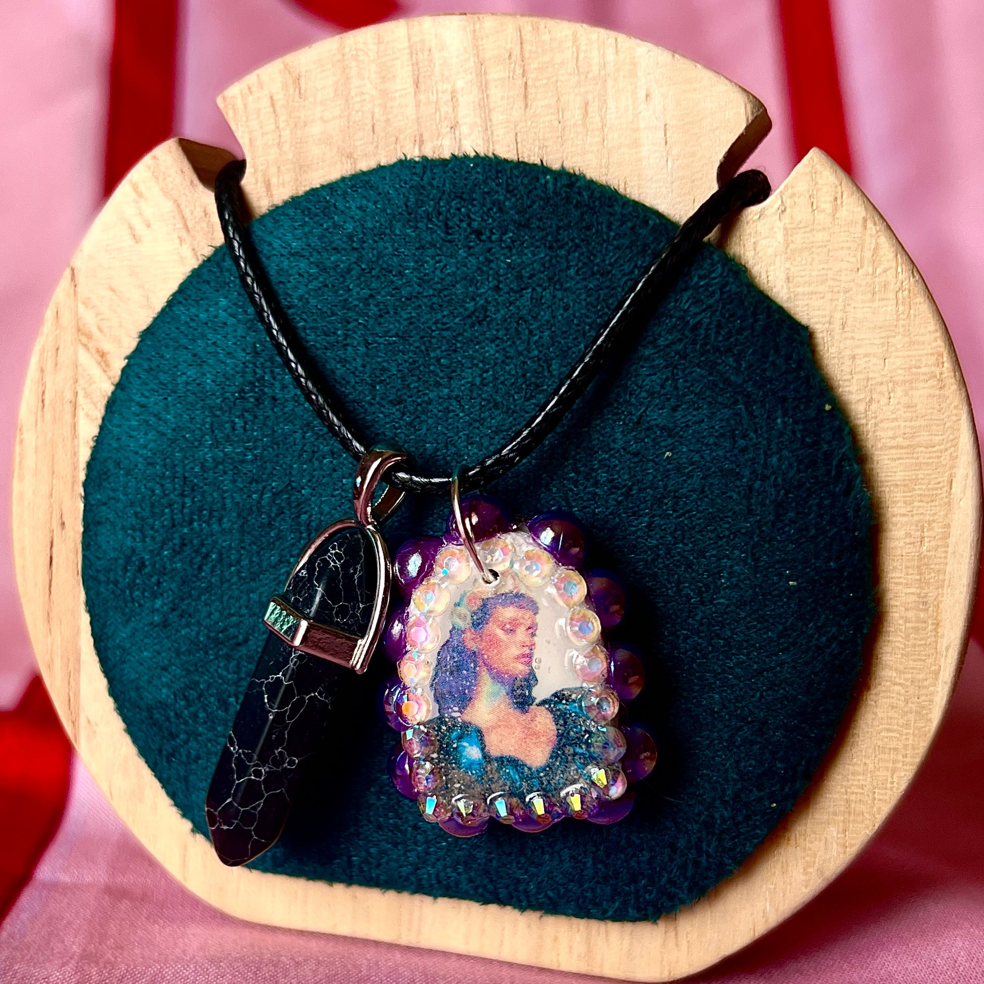 Yearning Princess necklace — dark romance handmade polymer clay princess charm bedazzled with iridescent pearls + rhinestones and finished with dramatic black crystal accent. Gift-ready Victorian-patterned box. Goth fairycore whimsigoth Y2K statement charm necklace; ready to ship in 1–3 days.