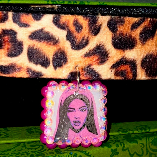Cheetah print choker necklace — 16" soft fabric cheetah print choker with neon hot pink Y2K nun charm handmade in polymer clay and bedazzled with iridescent beads. Gift-ready green Victorian-patterned box. Whimsigoth grunge indie statement choker; ready to ship in 1–3 business days.