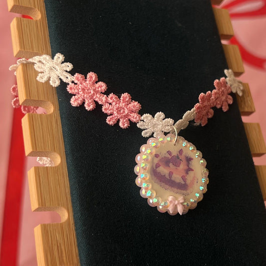Handcrafted polymer‑clay strawberry cake flower choker in pink lace, featuring iridescent pearls, rhinestones, and a cute coquette kawaii design—perfect sweet‑lolita, pastel, y2k aesthetic jewelry.