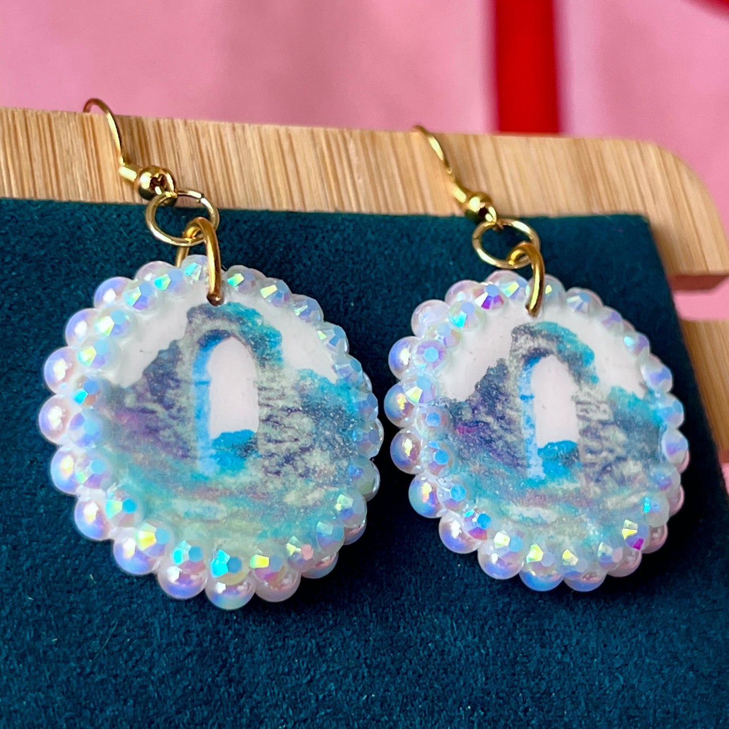 Magical archway charm necklace — one-of-a-kind medieval stone archway “portal” pendant hand-sculpted in polymer clay (approx. 1" tall x 0.75" wide) and bedazzled with iridescent pearls and rhinestones. Handmade wearable magic.