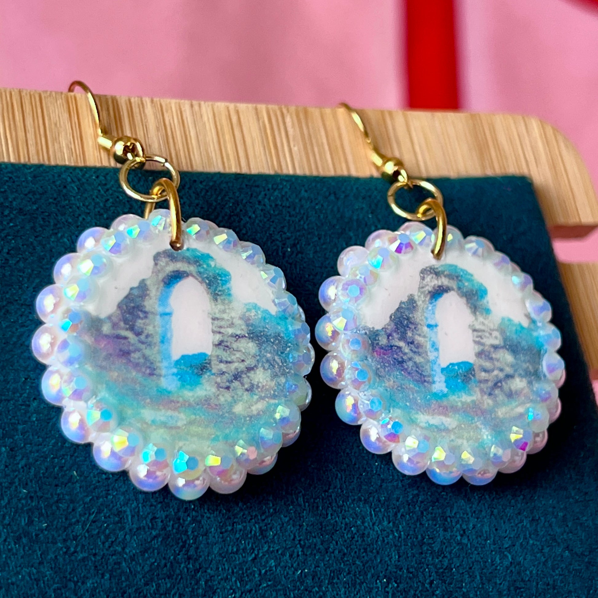 Magical archway charm necklace — one-of-a-kind medieval stone archway “portal” pendant hand-sculpted in polymer clay (approx. 1" tall x 0.75" wide) and bedazzled with iridescent pearls and rhinestones. Handmade wearable magic.