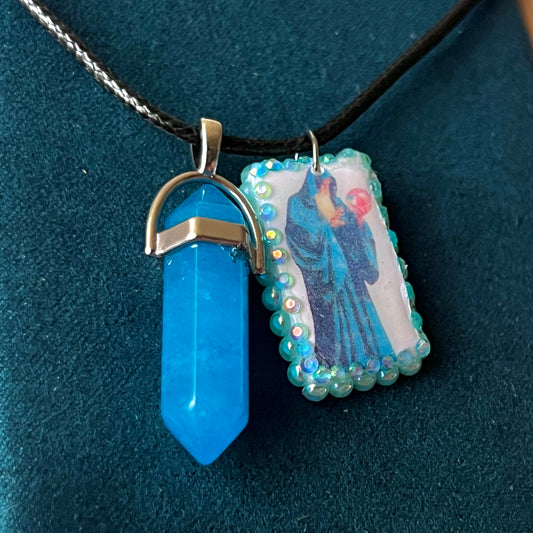 Handmade wizard charm necklace — one-of-a-kind clay mystical orb wizard charm bedazzled with iridescent pearls and paired with luminous blue gem pendant on 22" vegan leather chain with silver-tone hardware. Charm approx. 1". Ready to ship.