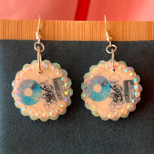 Retro CD and cassette tape earrings – handmade polymer‑clay charms bedazzled with iridescent beads, silver‑plated hypoallergenic hooks; vintage retro Y2K music charm perfect for cd earrings, cassette tape earrings, retro cd earrings, retro cassette earrings, music charm earrings, y2k earrings, vintage retro earrings, retro tech earrings, whimsigoth style.
