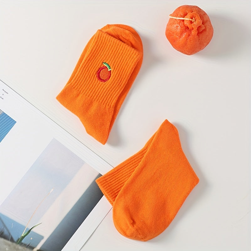 "orange you glad not to see these dogs" pair of socks