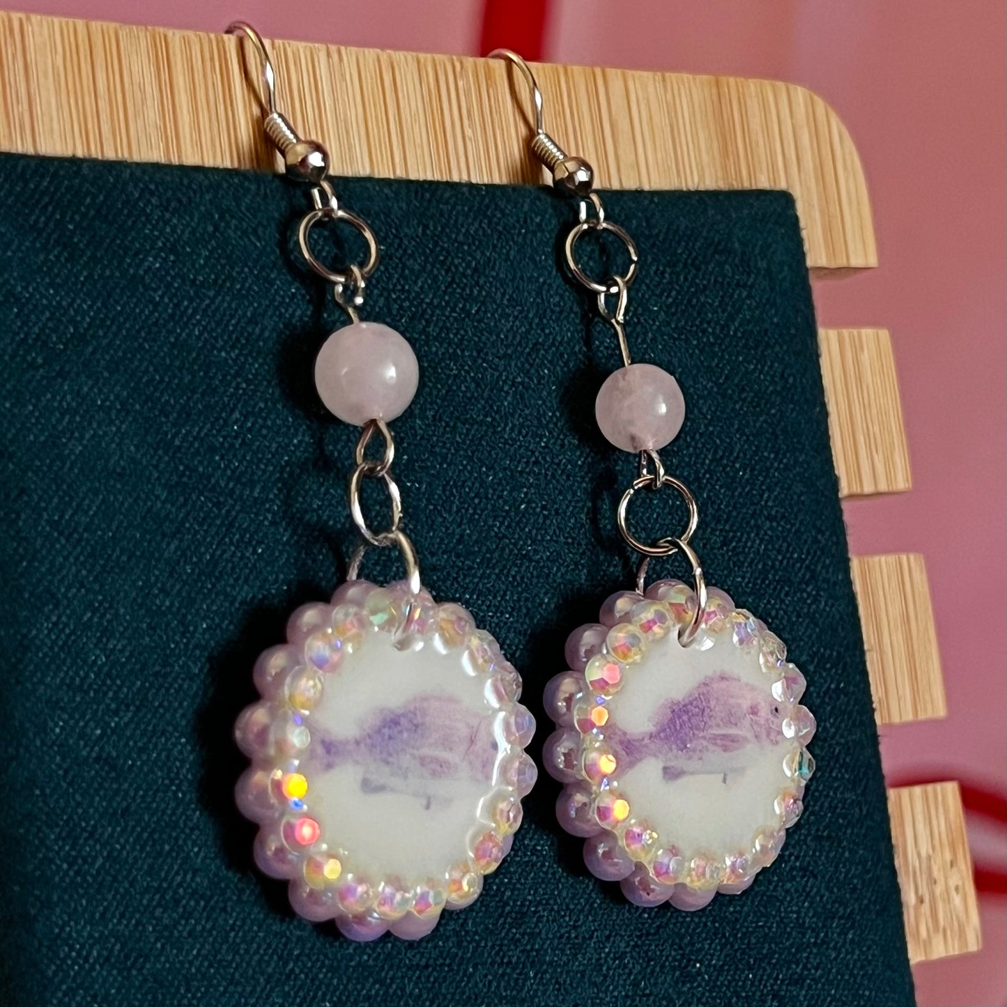 rose quartz earrings, pastel fish earrings, pink fish charm earrings, mermaidcore earrings, fairycore jewelry, coquette earrings, y2k earrings, pastel charm earrings, polymer clay earrings, rhinestone earrings, pearl earrings, iridescent pearl earrings, ocean themed earrings, handmade earrings, hypoallergenic earrings, cute pastel jewelry, rose quartz bead earrings, girly earrings, whimsical earrings, gift for her