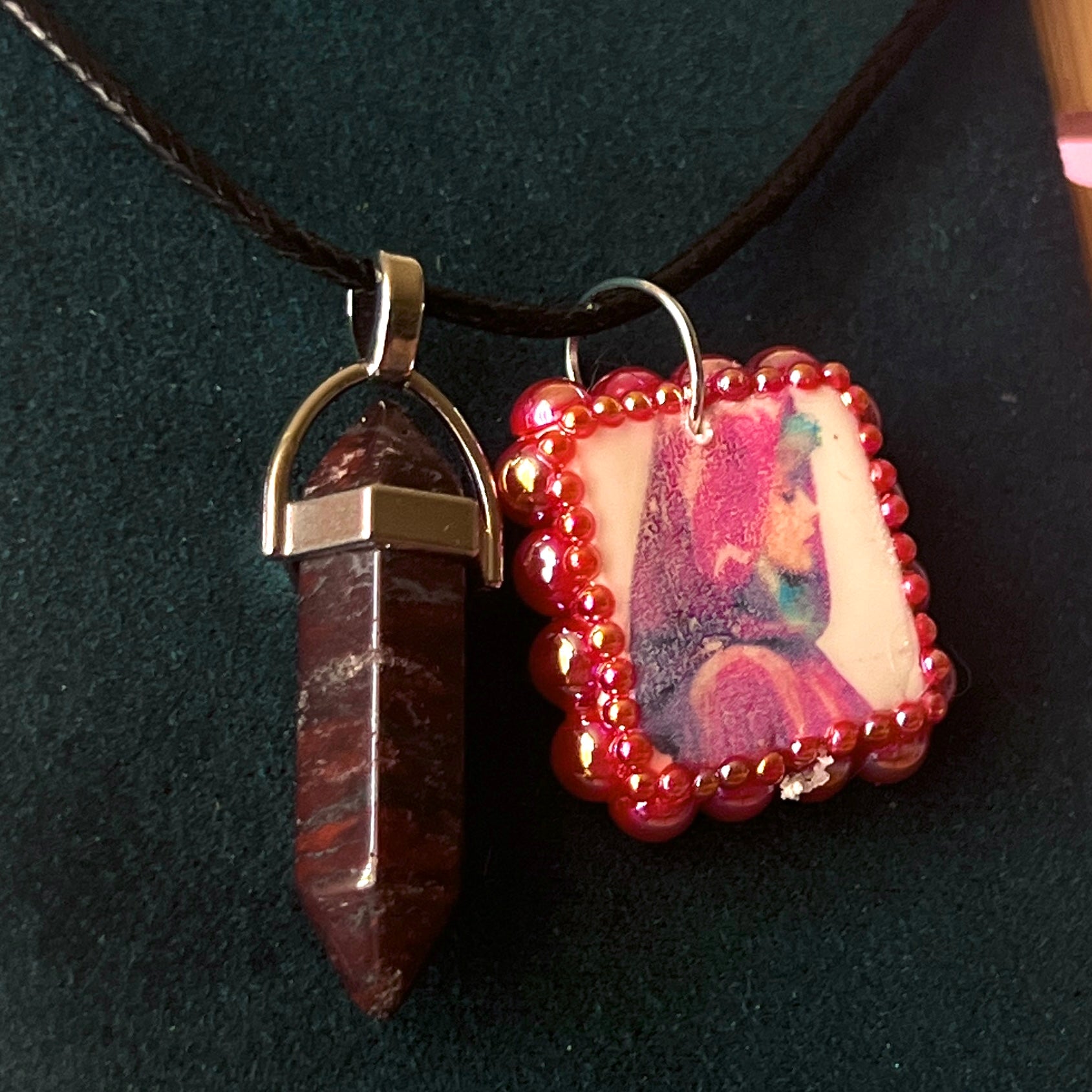 Red Riding Hood charm necklace — handmade polymer clay Red Riding Hood pendant hand-bedazzled with iridescent pearls + rhinestones, plus deep red crystal accent. Choose arch-shaped charm or square charm with burgundy + black gem drop. Gift-ready Victorian-patterned box. Fairycore goth Y2K dark fairytale jewelry; ready to ship in 1–3 days.