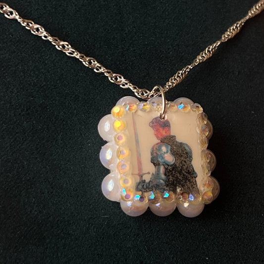 Iridescent knight & sword necklace — handmade polymer clay knight + sword charms bedazzled with iridescent beads on 20" 925 silver chain. Gift-ready green Victorian-patterned box. Fairycore coquette cottagecore Y2K charm necklace; ready to ship in 1–3 business days.