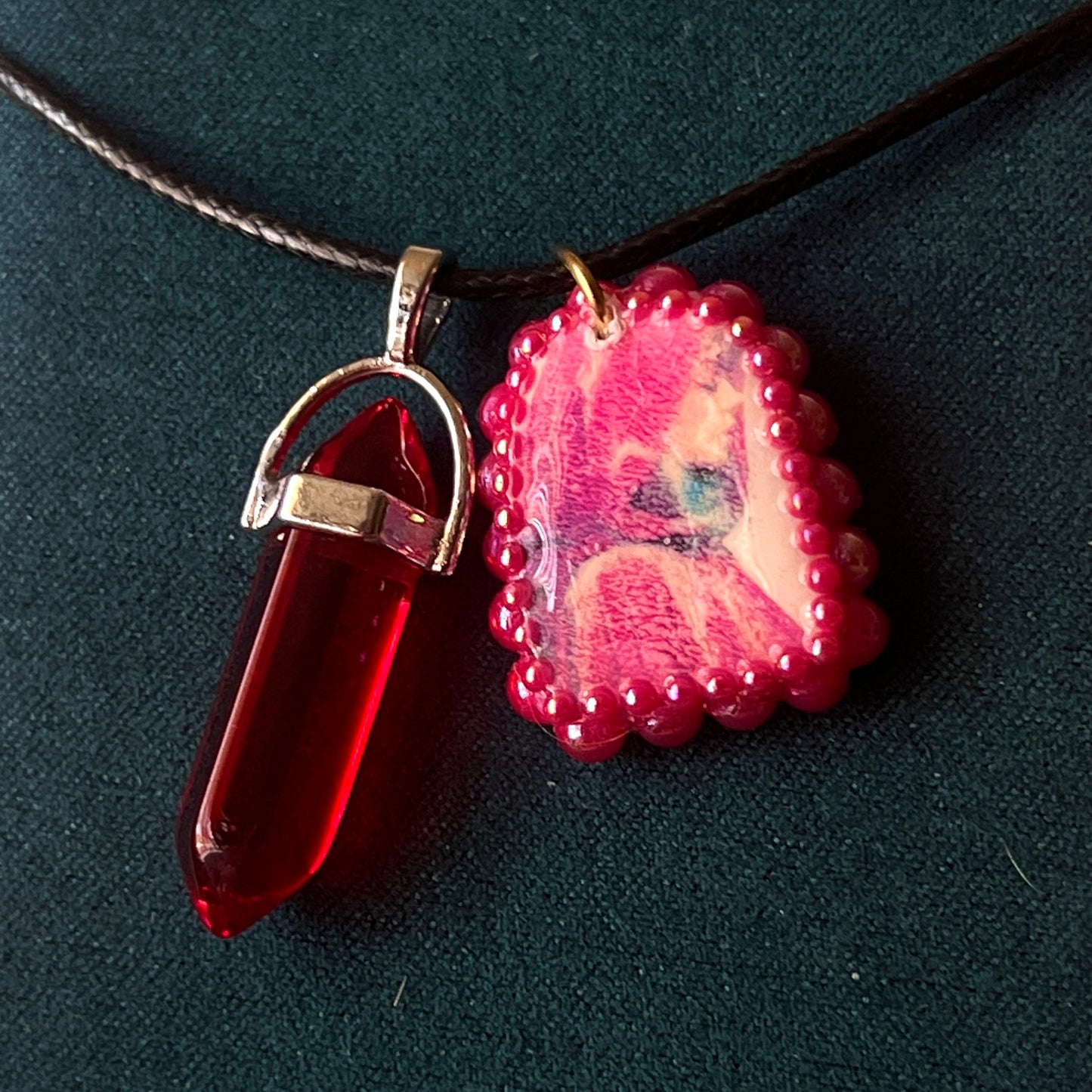 Red Riding Hood charm necklace — handmade polymer clay Red Riding Hood pendant hand-bedazzled with iridescent pearls + rhinestones, plus deep red crystal accent. Choose arch-shaped charm or square charm with burgundy + black gem drop. Gift-ready Victorian-patterned box. Fairycore goth Y2K dark fairytale jewelry; ready to ship in 1–3 days.