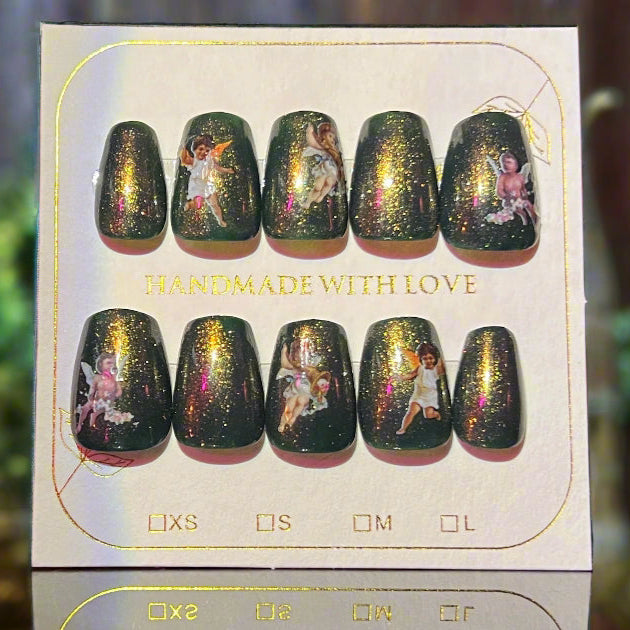 Set of decorative green nails with a shimmering gold topping and angels design on a card labeled 'Handmade with Love'.