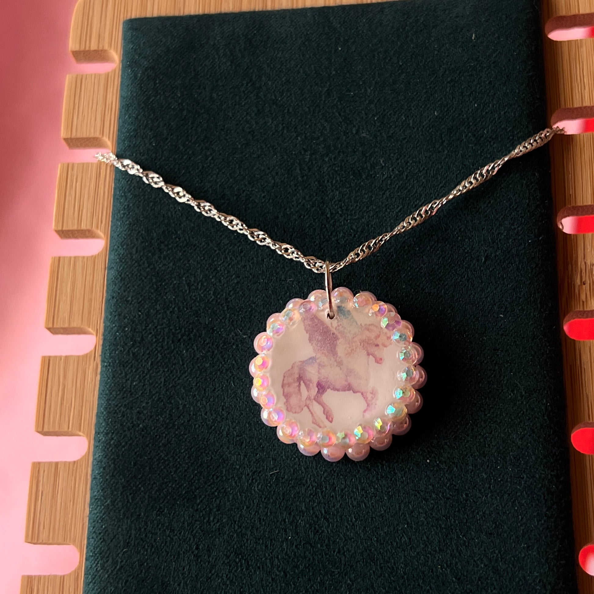 Pegasus pearl charm necklace — coquette fantasy jewelry with handmade pegasus charm bedazzled with pastel pearls on 20" 925 sterling silver chain. Ships gift-ready in green Victorian-patterned box; ready to ship. Medieval magic talisman necklace by Olive Made.
