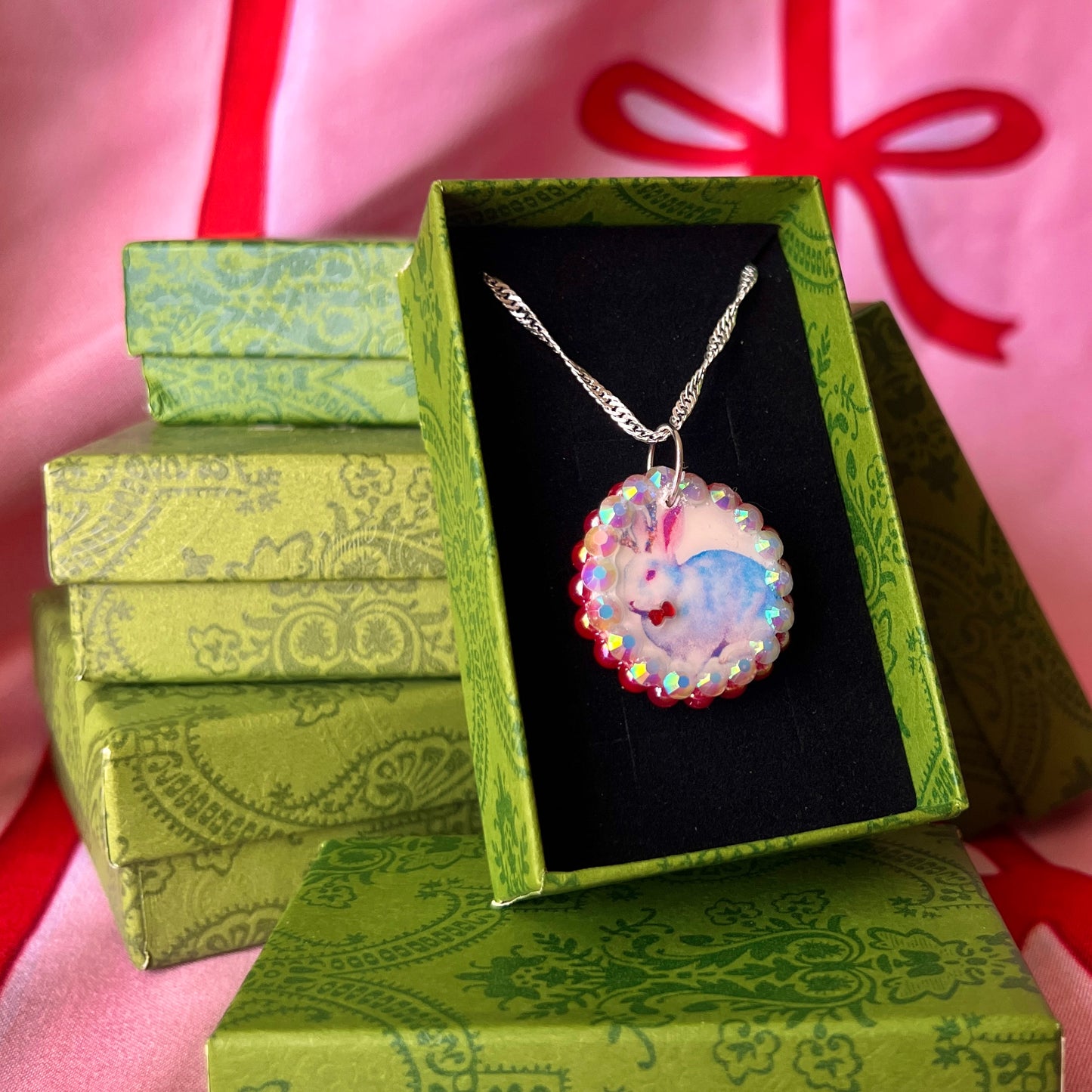 Mr & Mrs Bunny necklaces — handmade polymer clay jackalope bunny character charms bedazzled with red iridescent pearls + rhinestones on 20" 925 sterling silver chain. Choose Mr (red gem bow tie), Mrs (bow in ears), or matching gift set. Folklore romance fairycore jewelry; ready to ship in 1–3 days.