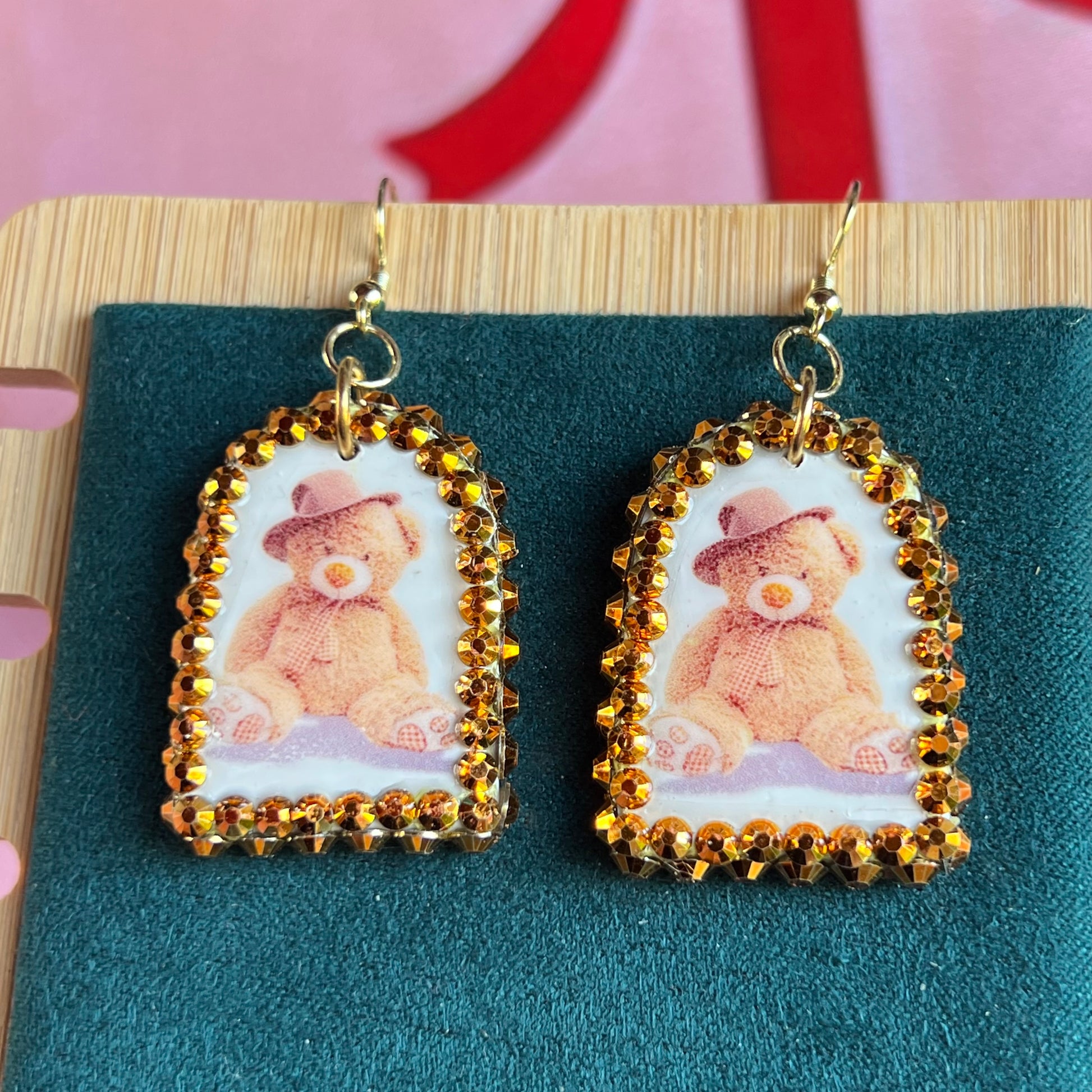 teddy bear earrings, bear earrings, teddy in hat earrings, kawaii earrings, kidcore earrings, indie earrings, party earrings, plushie earrings, polymer clay earrings, handmade earrings, clay statement earrings, orange rhinestone earrings, 14k gold plated earrings, cute animal earrings, novelty earrings, maximalist earrings, Olive Made jewelry, wearable art earrings, handmade bear jewelry, kawaii jewelry, kidcore jewelry, ready to ship earrings