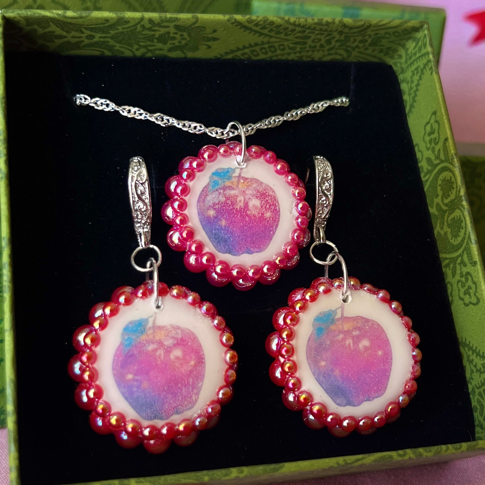 Apple charm earrings & necklace set — handmade polymer clay apple charms bedazzled with iridescent red pearls. Earrings have ornate silver-plated hooks; necklace is on 20" 925 sterling silver chain. Sold separately or as gift set; coquette fruitcore Y2K jewelry. Ready to ship in 1–3 business days.