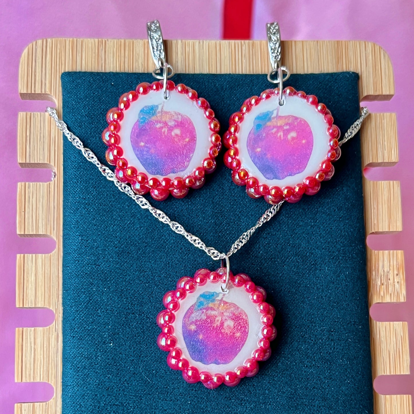 Apple charm earrings & necklace set — handmade polymer clay apple charms bedazzled with iridescent red pearls. Earrings have ornate silver-plated hooks; necklace is on 20" 925 sterling silver chain. Sold separately or as gift set; coquette fruitcore Y2K jewelry. Ready to ship in 1–3 business days.