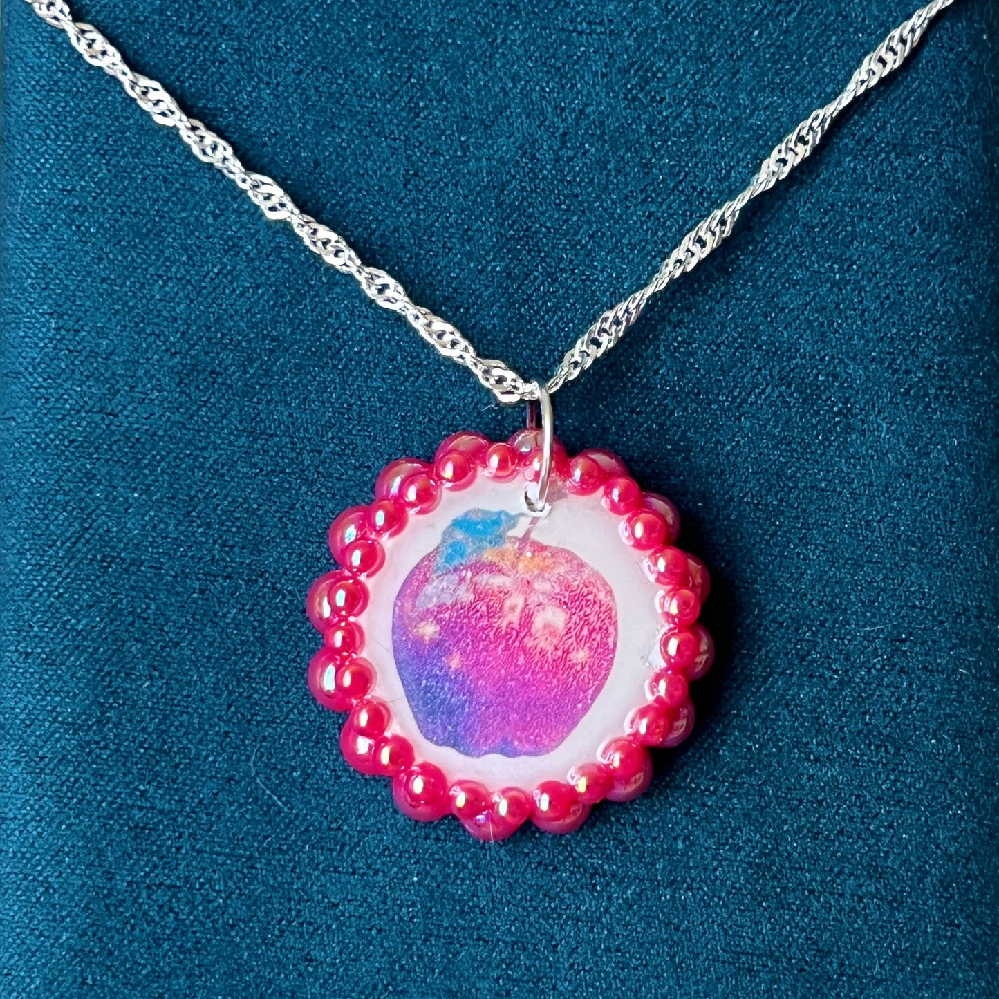Apple charm earrings & necklace set — handmade polymer clay apple charms bedazzled with iridescent red pearls. Earrings have ornate silver-plated hooks; necklace is on 20" 925 sterling silver chain. Sold separately or as gift set; coquette fruitcore Y2K jewelry. Ready to ship in 1–3 business days.