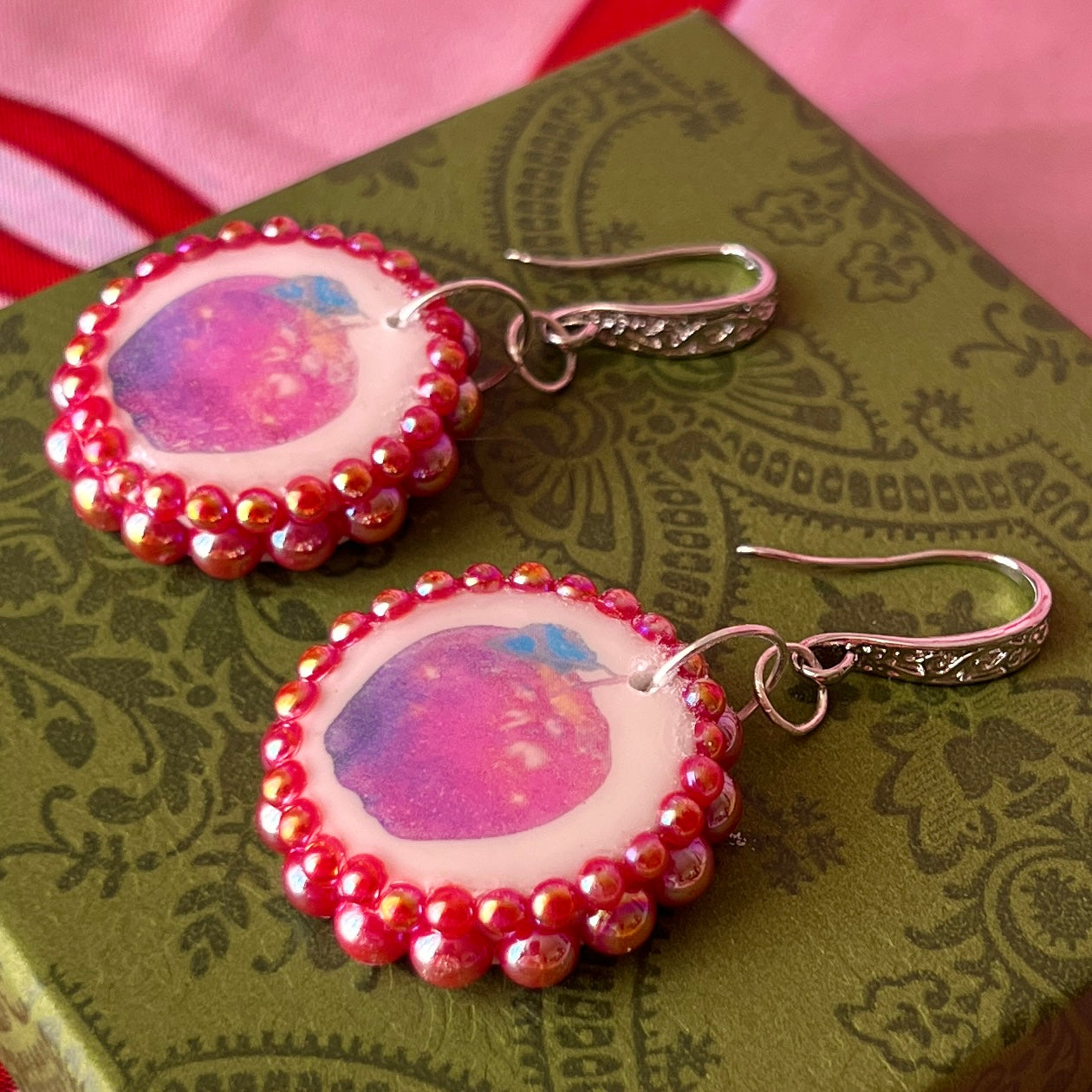 Apple charm earrings & necklace set — handmade polymer clay apple charms bedazzled with iridescent red pearls. Earrings have ornate silver-plated hooks; necklace is on 20" 925 sterling silver chain. Sold separately or as gift set; coquette fruitcore Y2K jewelry. Ready to ship in 1–3 business days.