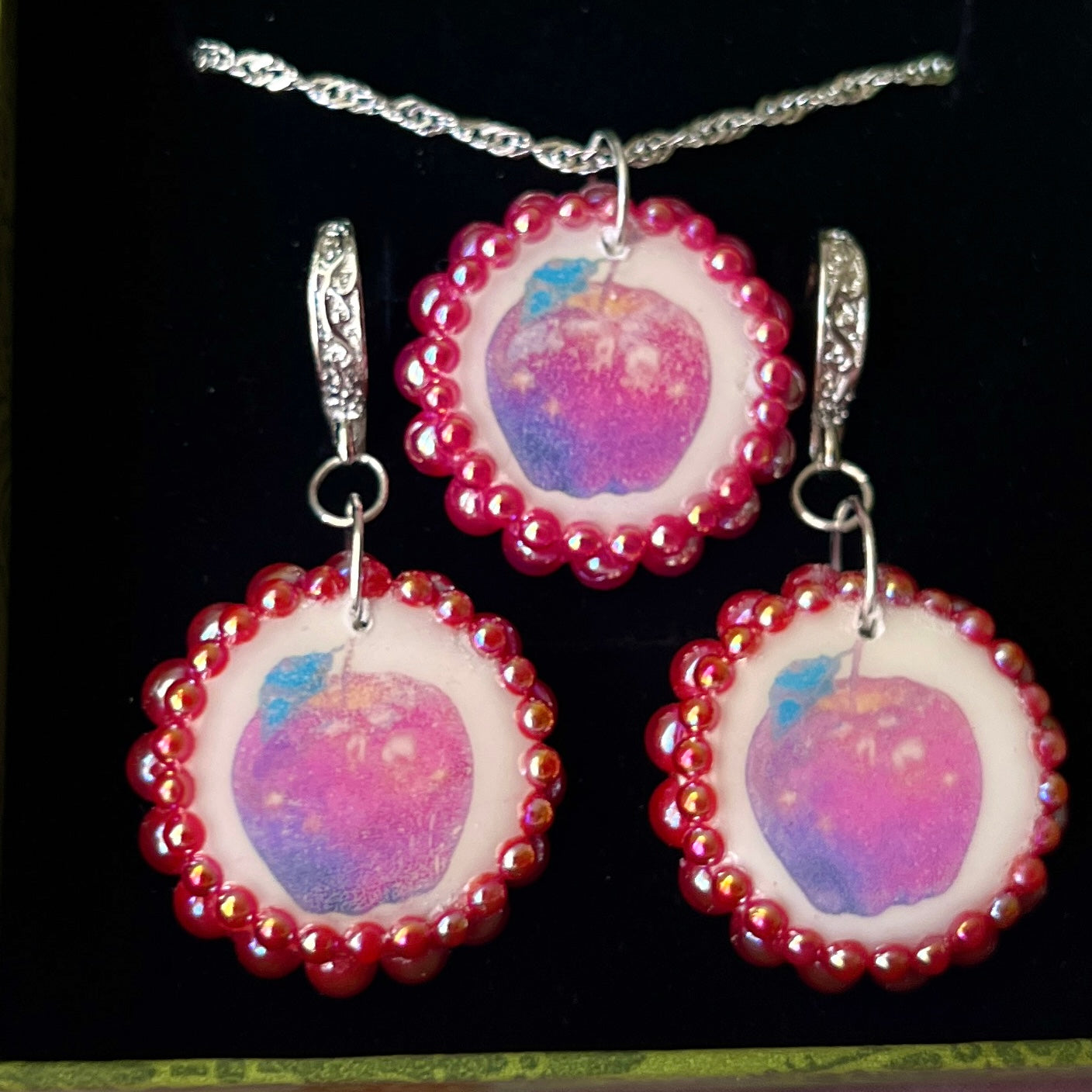 Apple charm earrings & necklace set — handmade polymer clay apple charms bedazzled with iridescent red pearls. Earrings have ornate silver-plated hooks; necklace is on 20" 925 sterling silver chain. Sold separately or as gift set; coquette fruitcore Y2K jewelry. Ready to ship in 1–3 business days.
