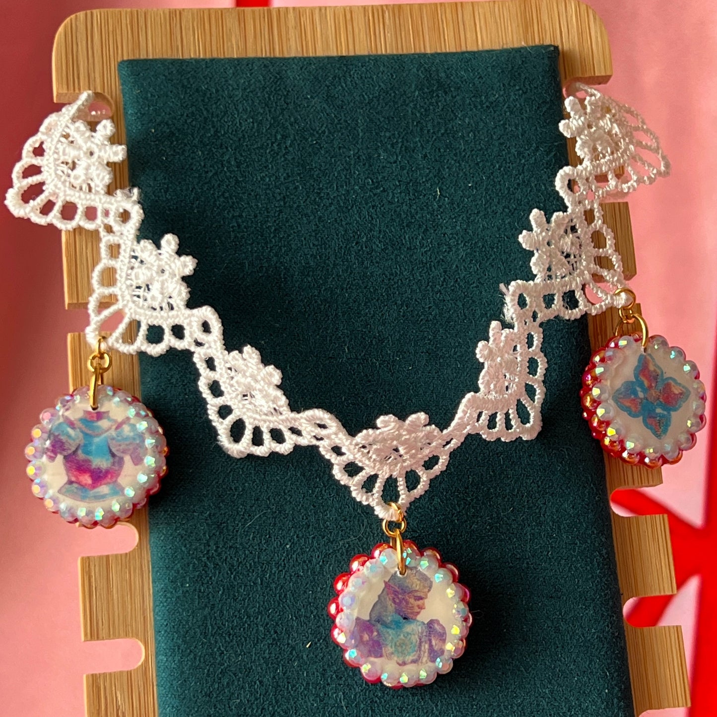 Armored Elf lace choker necklace — handmade polymer clay 3-charm “armored collage” bedazzled with iridescent beads on white lace choker. Gift-ready green Victorian-patterned box. Whimsigoth fairycore coquette cottagecore Y2K choker; ready to ship in 1–3 business days.