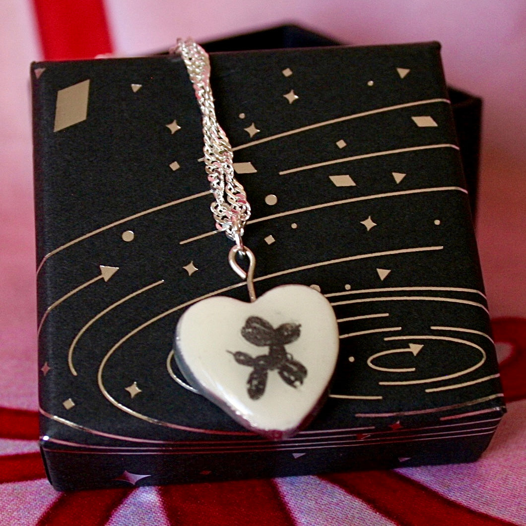 Balloon dog necklace — handmade black & white polymer clay balloon dog charm with metallic silver-black finish on 20" 925 sterling silver chain. Playful retro kidcore Y2K monochrome jewelry; gift-ready black celestial box. Ready to ship in 1–3 days.