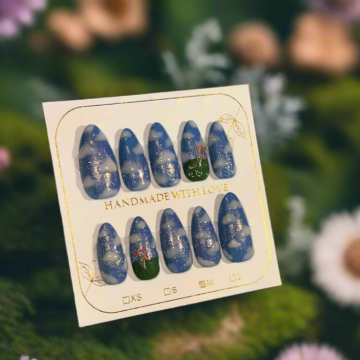 Card with nail art designs on a colorful background