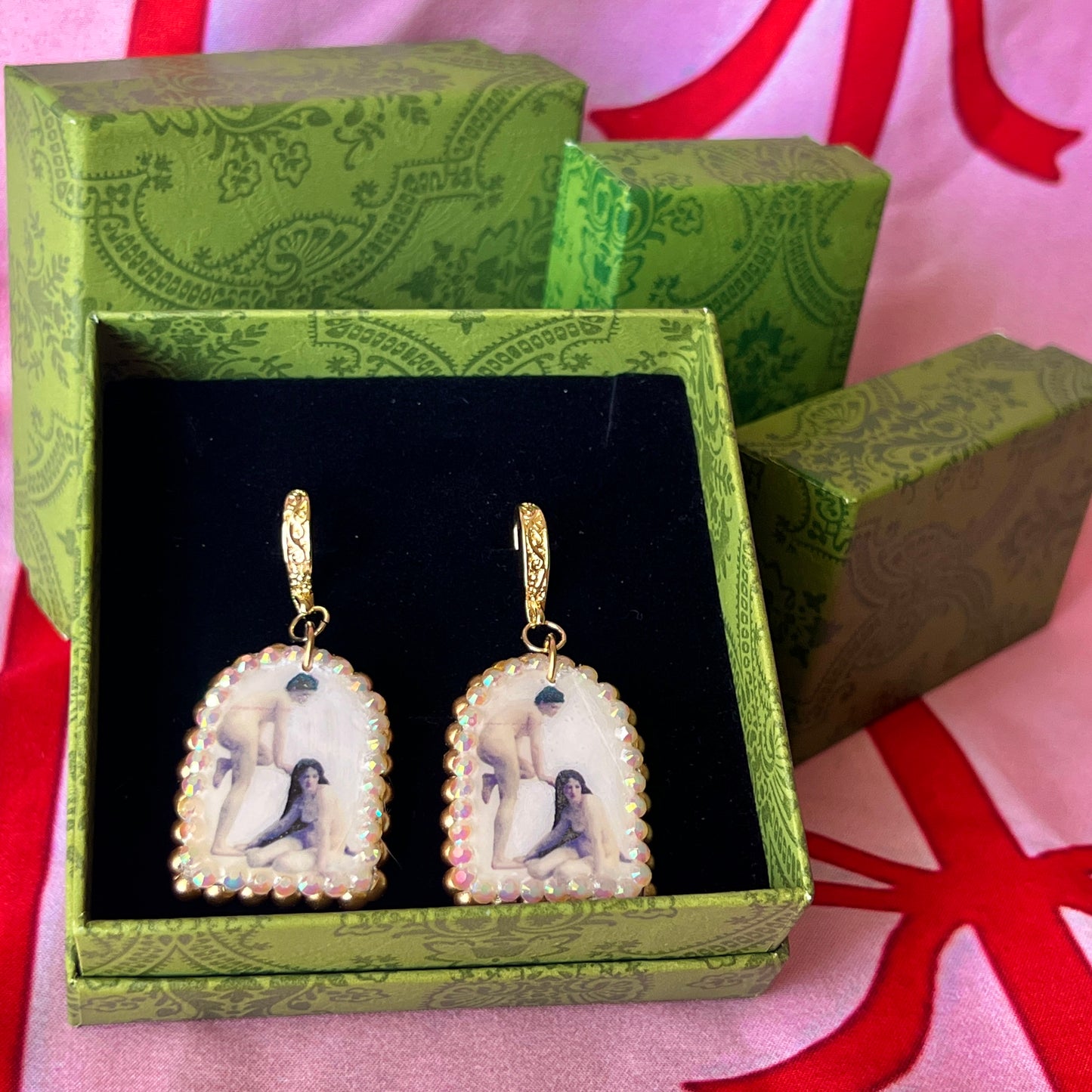 A wearable‑art pair of Bouguereau Bathers earrings — white polymer‑clay arch charms printed with “The Bathers” artwork, embellished with gold pearls and clear rhinestones, on 18k gold‑plated hooks; perfect museum‑core, renaissance‑core, coquette statement earrings for art lovers.
