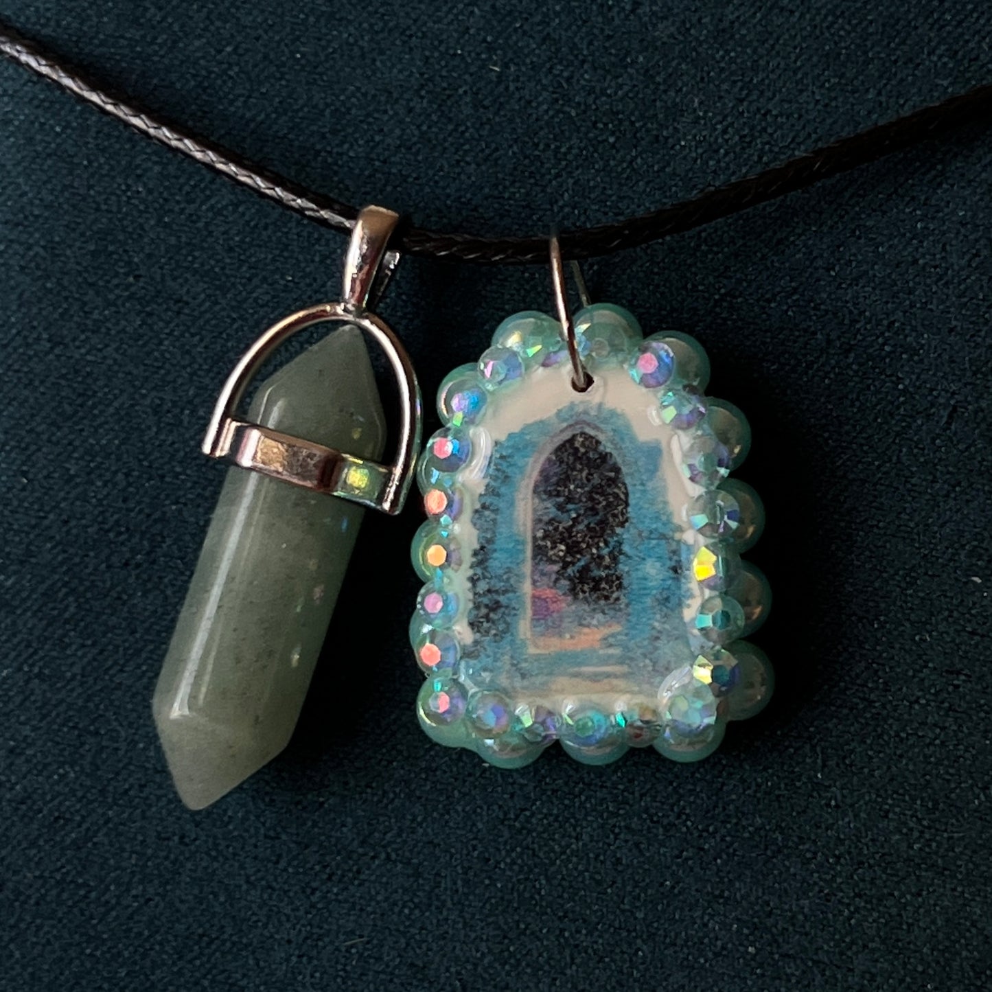 Magical archway charm necklace — one-of-a-kind medieval stone archway “portal” pendant hand-sculpted in polymer clay (approx. 1" tall x 0.75" wide) and bedazzled with iridescent pearls and rhinestones. Handmade wearable magic.