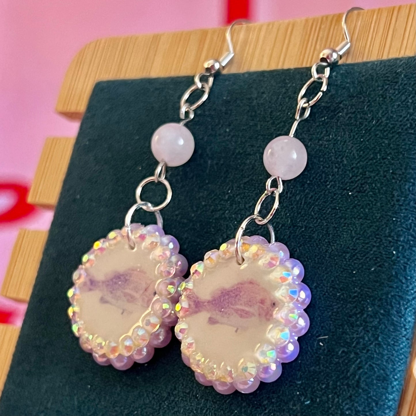 rose quartz earrings, pastel fish earrings, pink fish charm earrings, mermaidcore earrings, fairycore jewelry, coquette earrings, y2k earrings, pastel charm earrings, polymer clay earrings, rhinestone earrings, pearl earrings, iridescent pearl earrings, ocean themed earrings, handmade earrings, hypoallergenic earrings, cute pastel jewelry, rose quartz bead earrings, girly earrings, whimsical earrings, gift for her