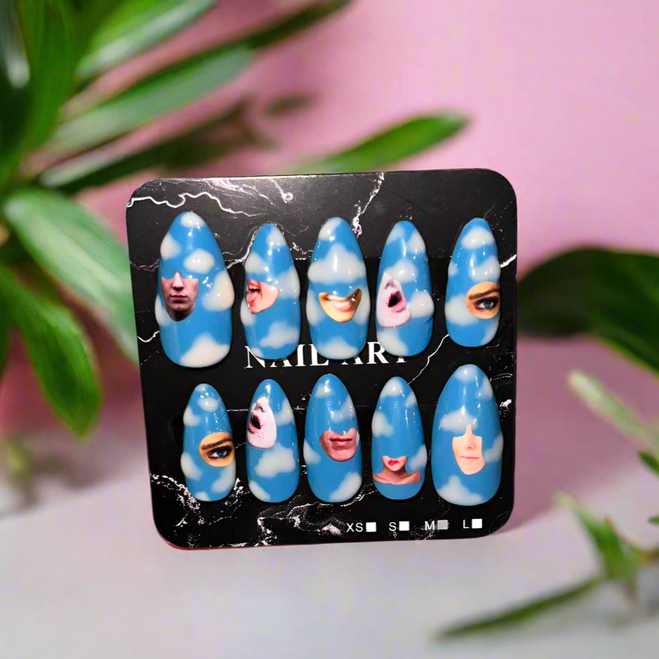 Pack of blue nail art stickers on a patterned surface