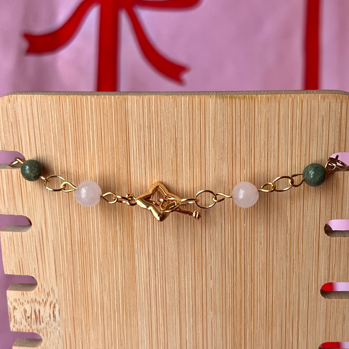 Fairycore crystal portrait necklace — 20" beaded necklace with rose quartz, Indian agate, and upcycled rutilated quartz plus handmade iridescent bedazzled portrait charm. 18k gold plated findings + 18k gold filled jump rings; ornate toggle clasp. Gift-ready green Victorian-style box; ready to ship.