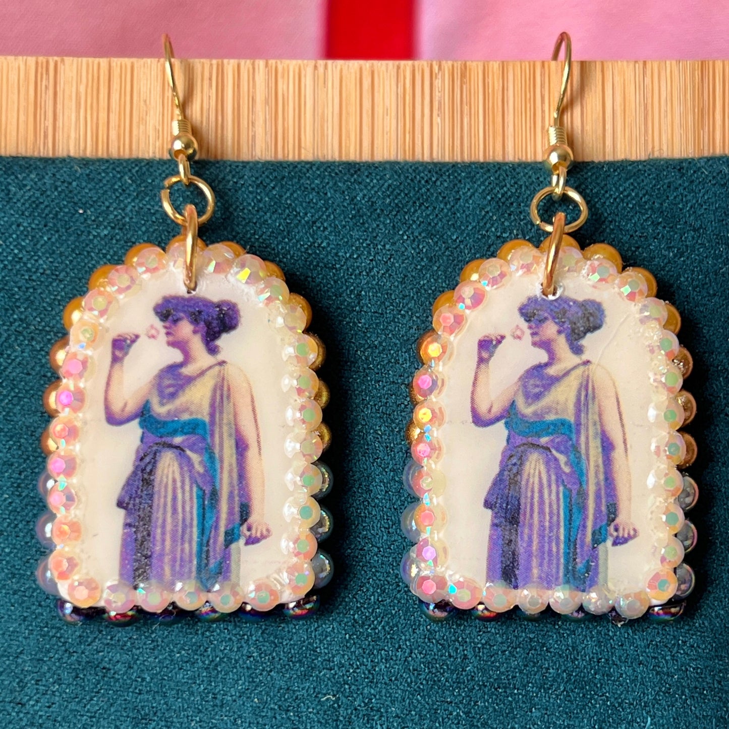 Antique-inspired “Fragrant Rose” earrings featuring handmade polymer‑clay oil‑painting charms bedazzled with a gradient of iridescent pearls and rhinestones, gold‑plated hypoallergenic hooks, and a romantic, vintage‑vibe perfect for coquette, alt‑romantic and vintage‑inspired jewelry lovers.