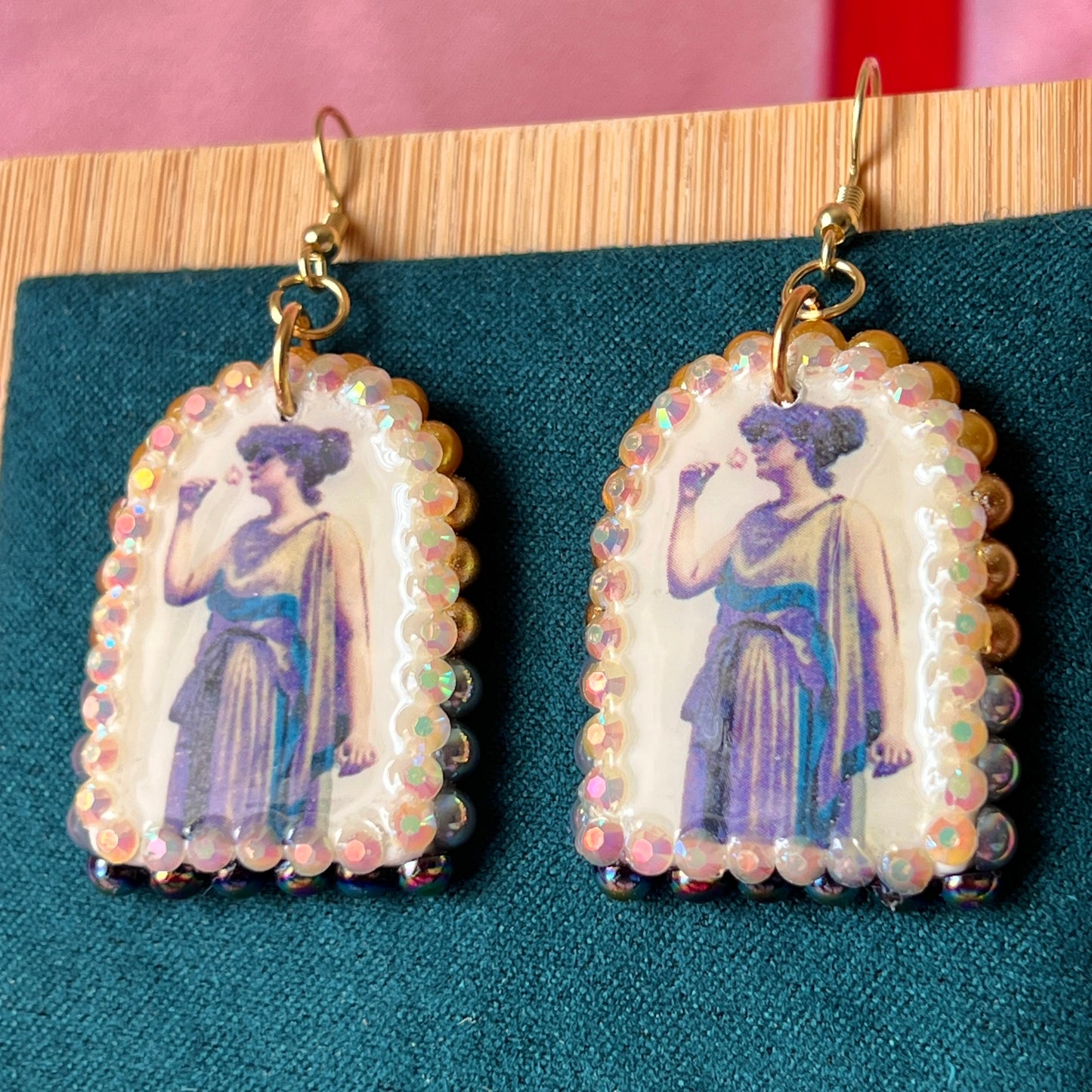 Antique-inspired “Fragrant Rose” earrings featuring handmade polymer‑clay oil‑painting charms bedazzled with a gradient of iridescent pearls and rhinestones, gold‑plated hypoallergenic hooks, and a romantic, vintage‑vibe perfect for coquette, alt‑romantic and vintage‑inspired jewelry lovers.