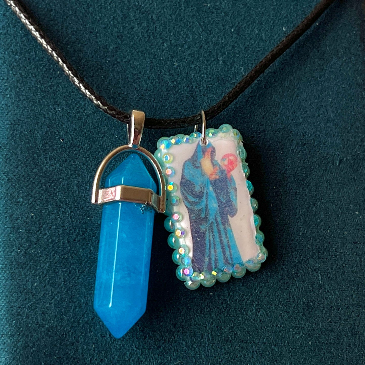 Handmade wizard charm necklace — one-of-a-kind clay mystical orb wizard charm bedazzled with iridescent pearls and paired with luminous blue gem pendant on 22" vegan leather chain with silver-tone hardware. Charm approx. 1". Ready to ship.