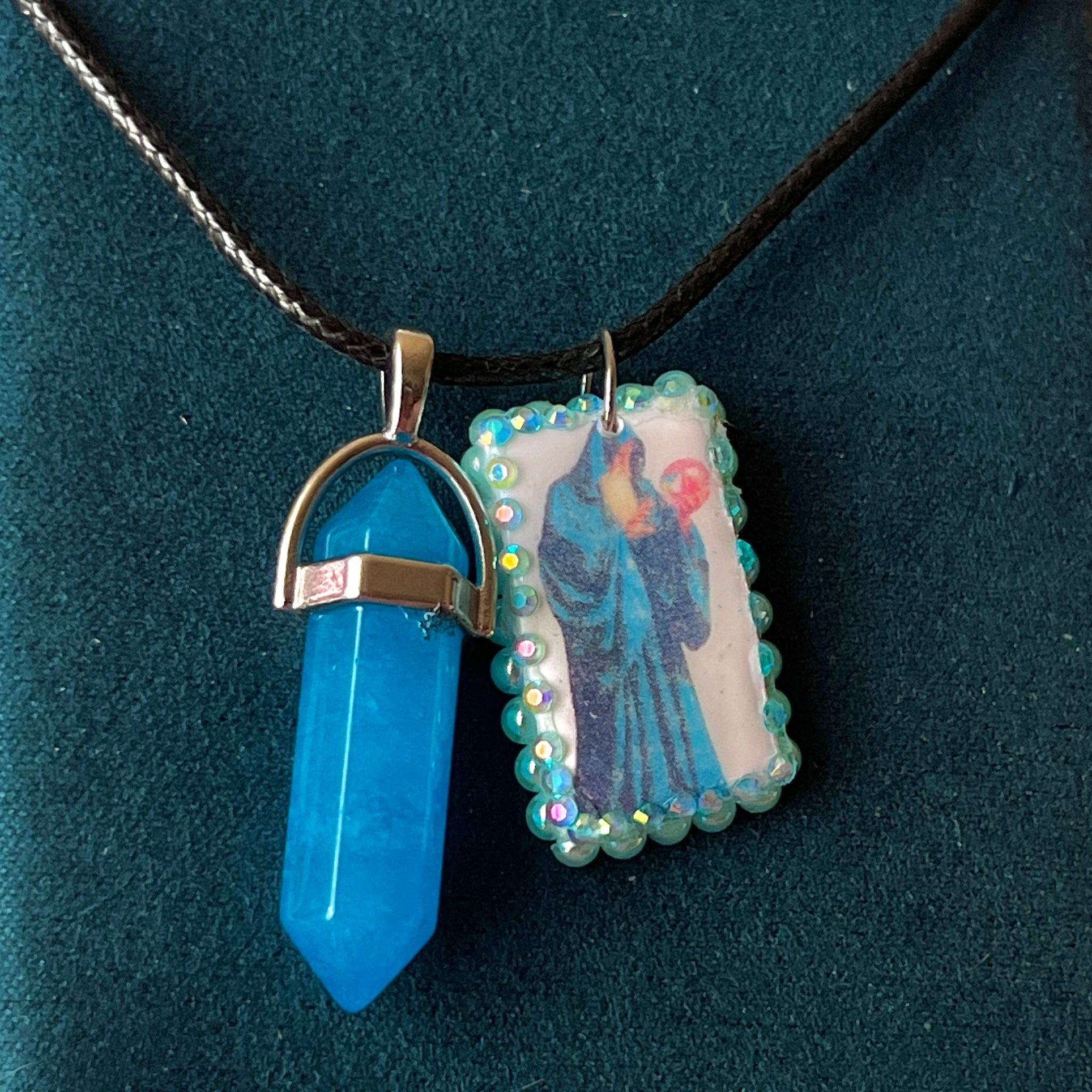 Handmade wizard charm necklace — one-of-a-kind clay mystical orb wizard charm bedazzled with iridescent pearls and paired with luminous blue gem pendant on 22" vegan leather chain with silver-tone hardware. Charm approx. 1". Ready to ship.